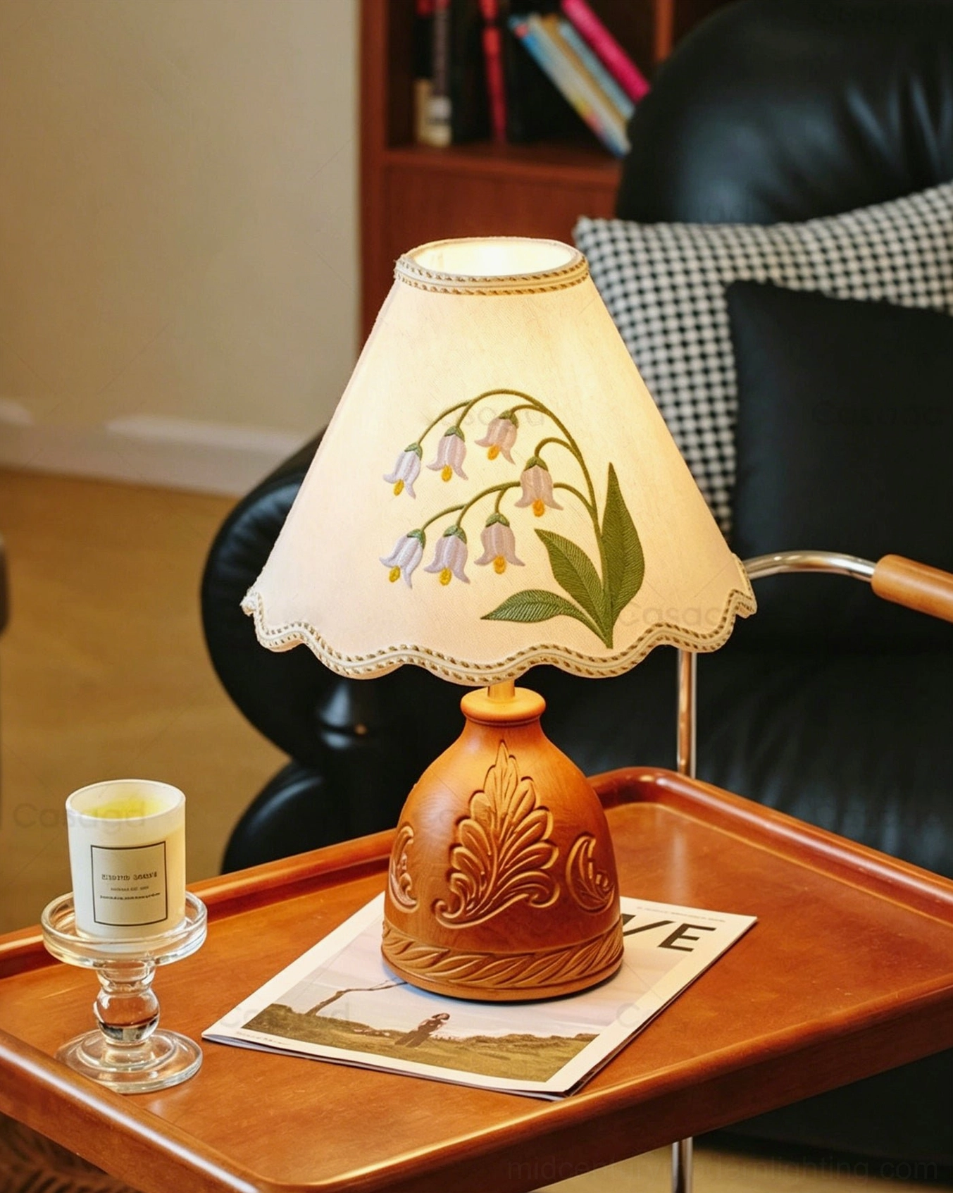 Vintage-inspired Maisie table lamp three-quarter angle showing carved wood craftsmanship and fabric detailing