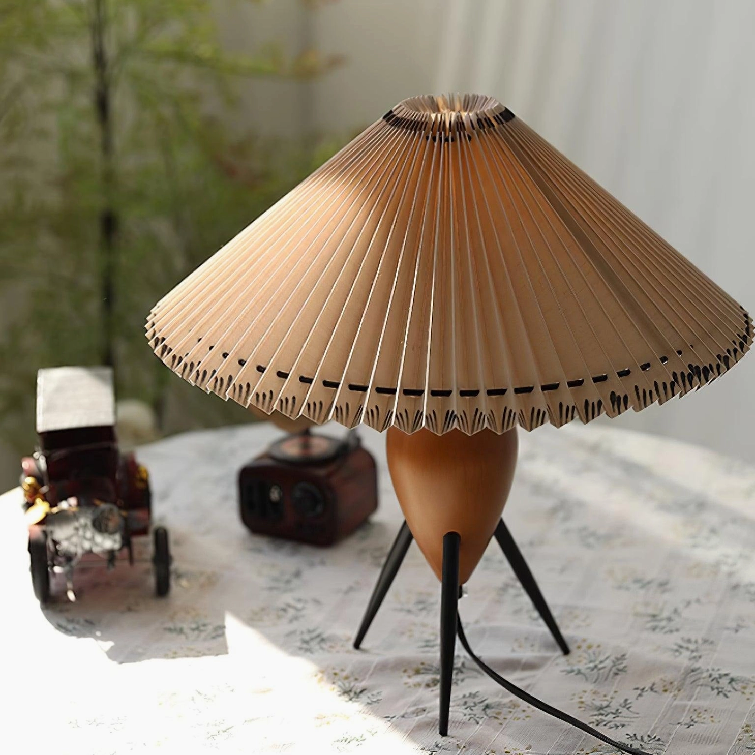 Makie mid-century modern tripod table lamp with pleated beige shade, complete product view