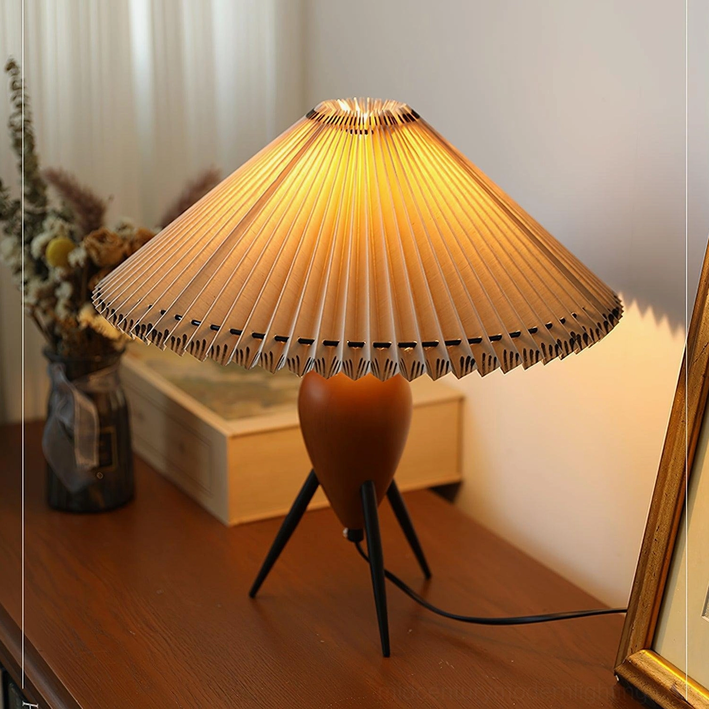 Makie tripod lamp ambient lighting showcase, warm glow illuminating interior space