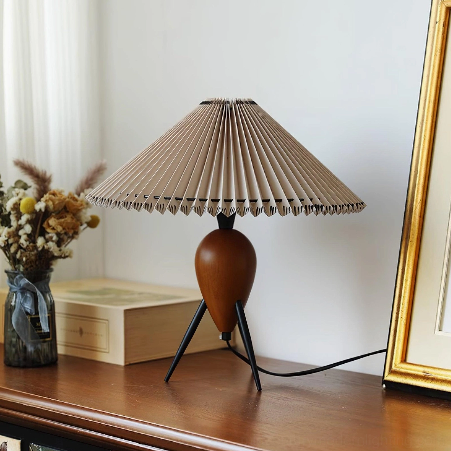 Makie tripod lamp walnut base and black metal legs detail, mid-century modern design elements