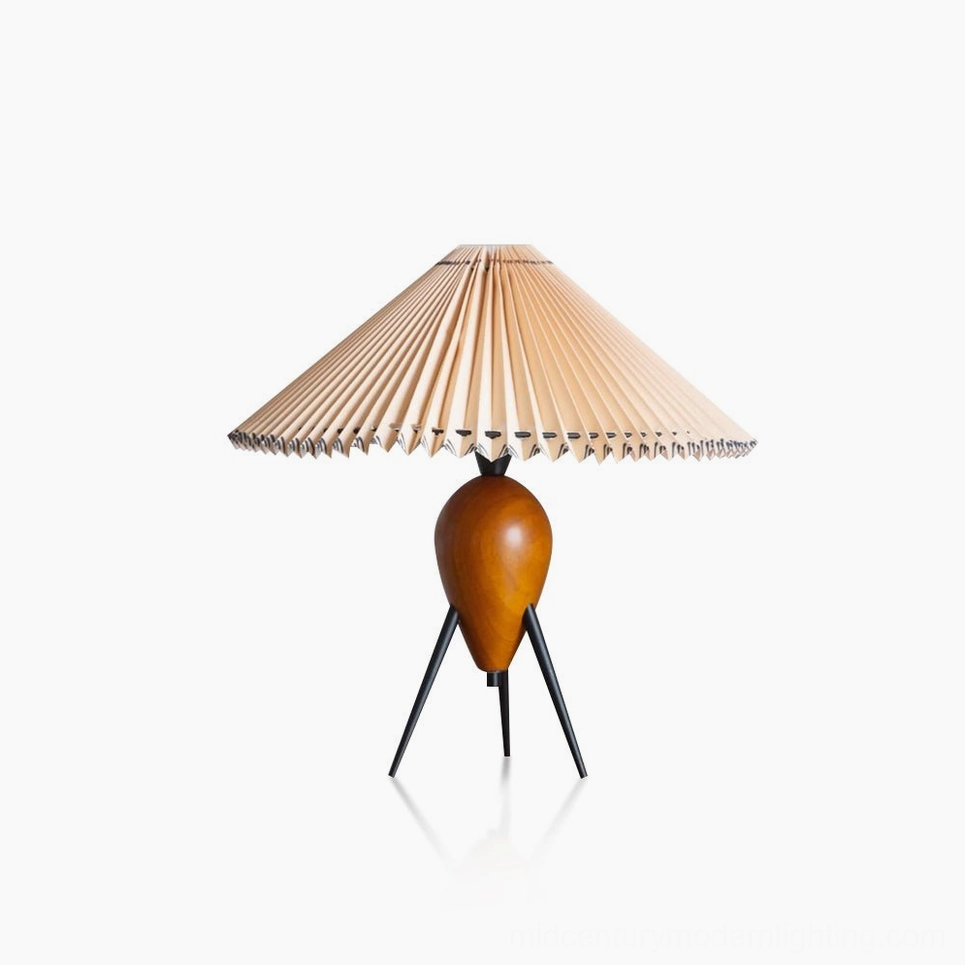 Makie mid-century modern tripod table lamp with beige pleated linen shade and walnut wood base, front studio view