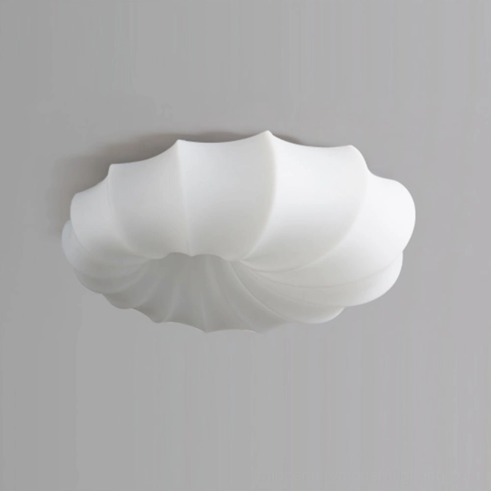 Malibu cream scalloped ceiling light in bedroom creating soft warm ambiance