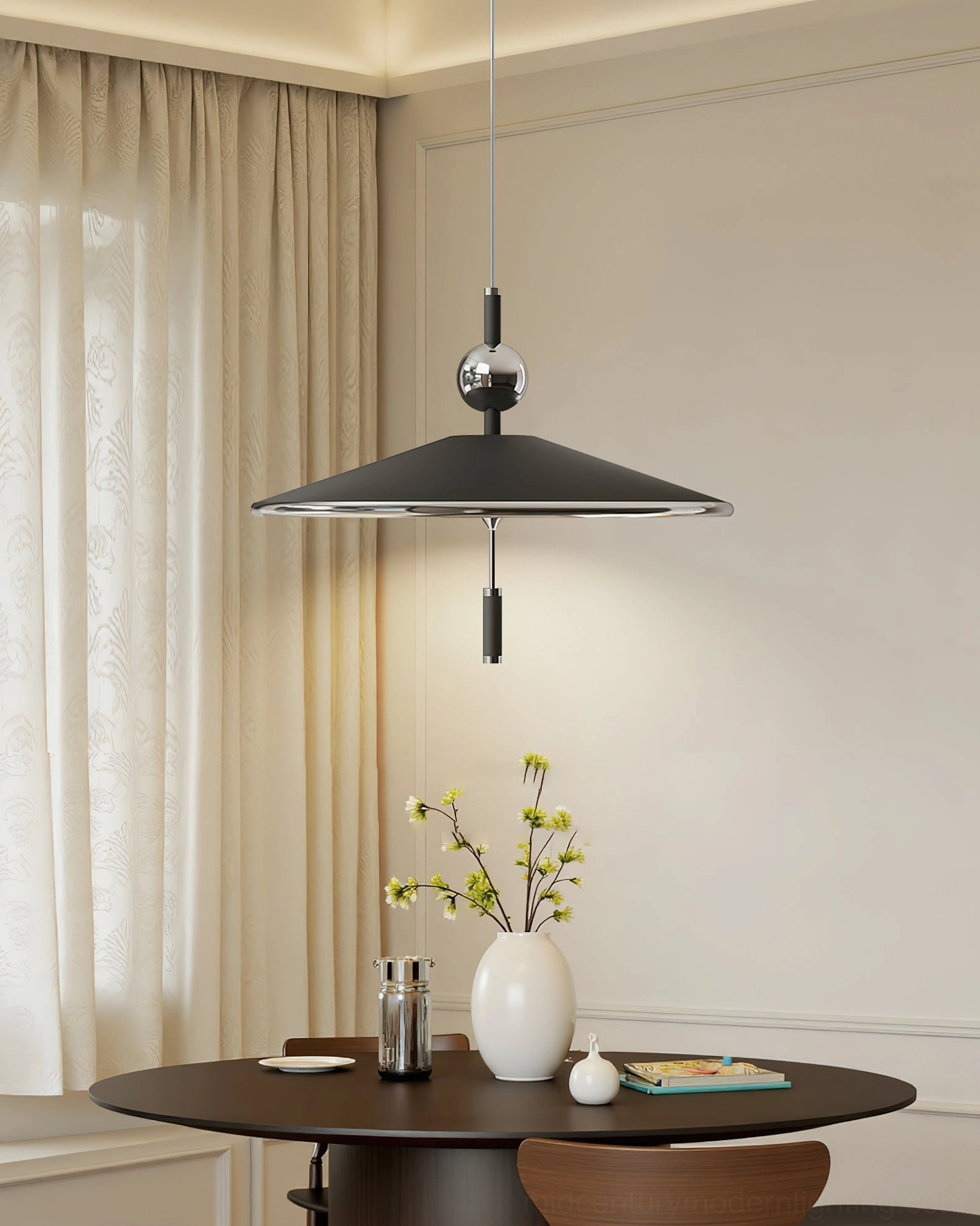 Single Malmo geometric pendant lamp creating ambient lighting above wooden dining table in residential space