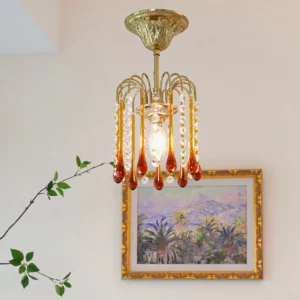 Illuminated Maltose crystal pendant ceiling light glowing warm amber light in vintage home interior with landscape art