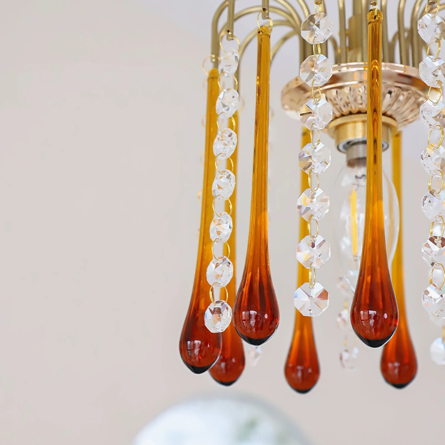Maltose ceiling light mounted above dining or entryway in home interior demonstrating room placement and lighting effect