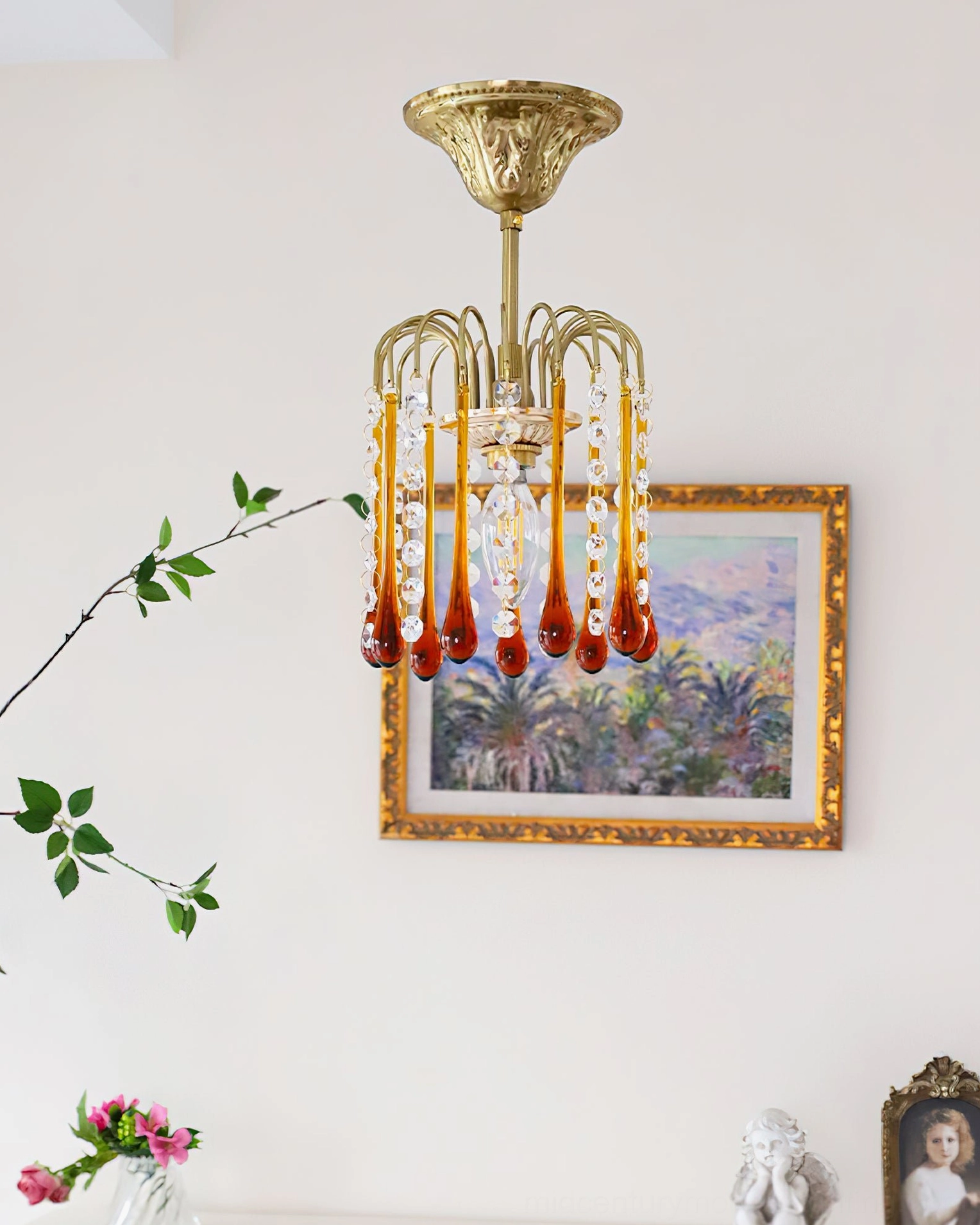 Maltose vintage ceiling light fixture with neatly arranged crystal pendant drops displayed in elegant home interior with artwork
