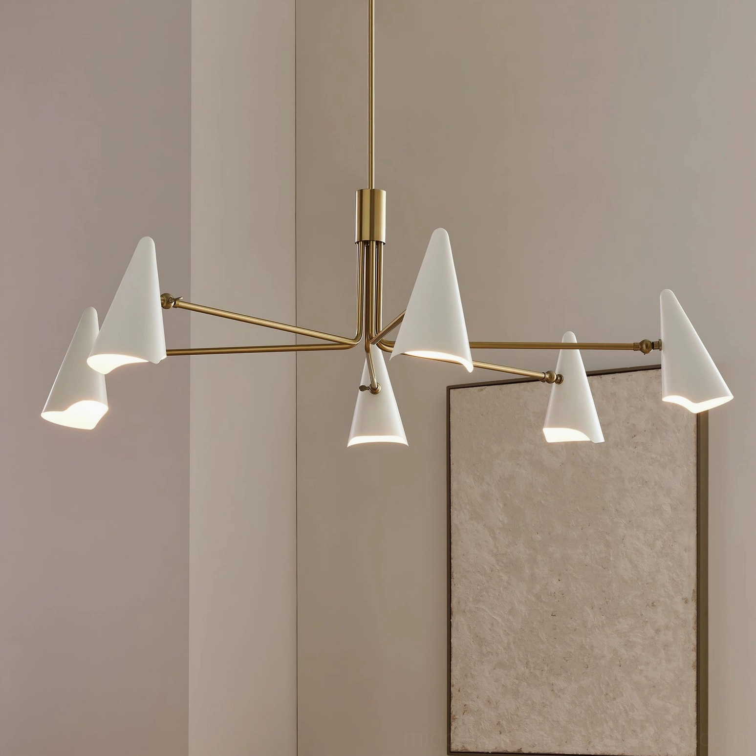 Close-up front view of Mancini chandelier showing exposed brass hardware and tapered white cone shades