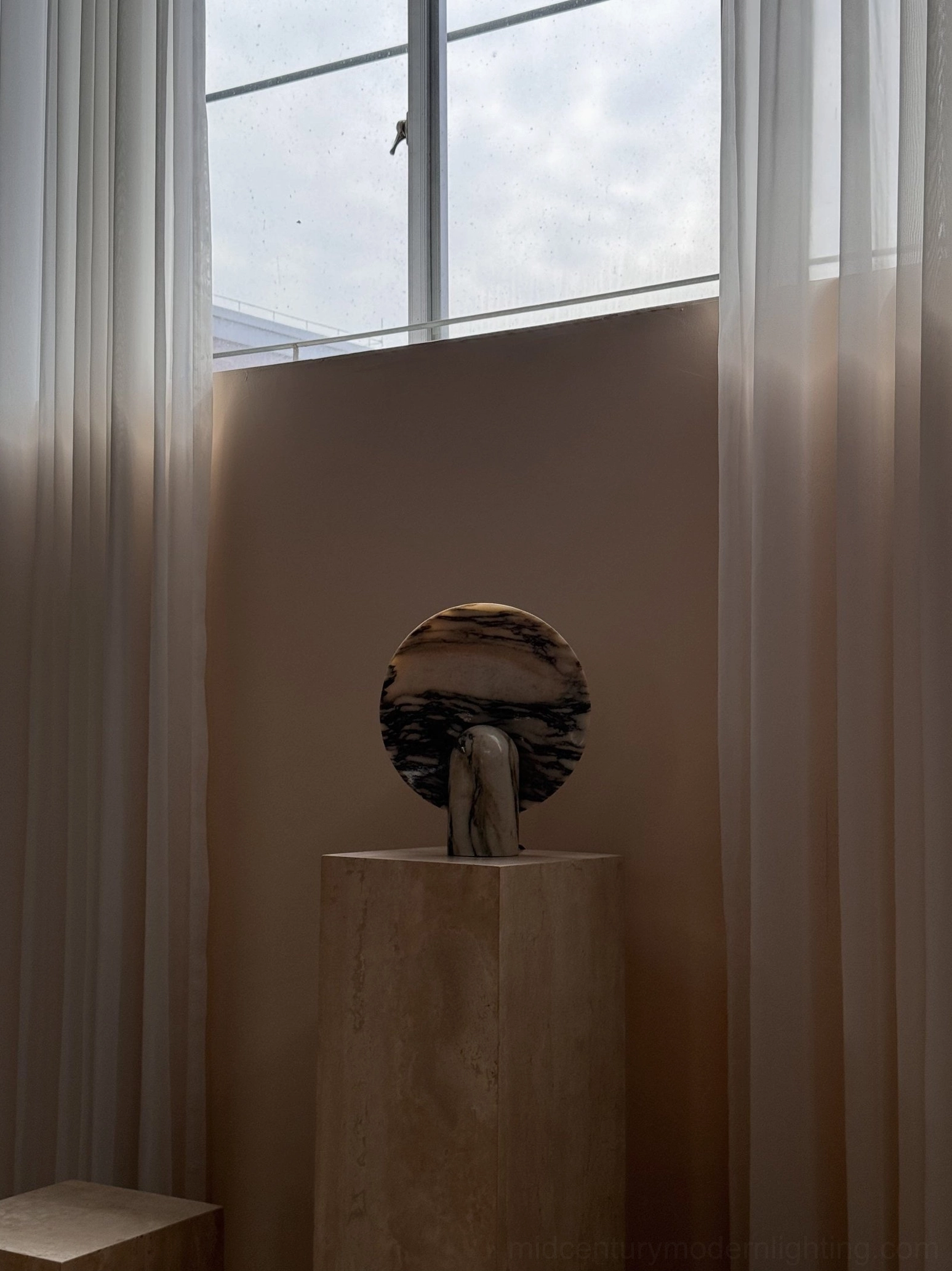 Marble table lamp illuminated interior showing warm 3000K light temperature and comfortable ambient lighting for modern living spaces