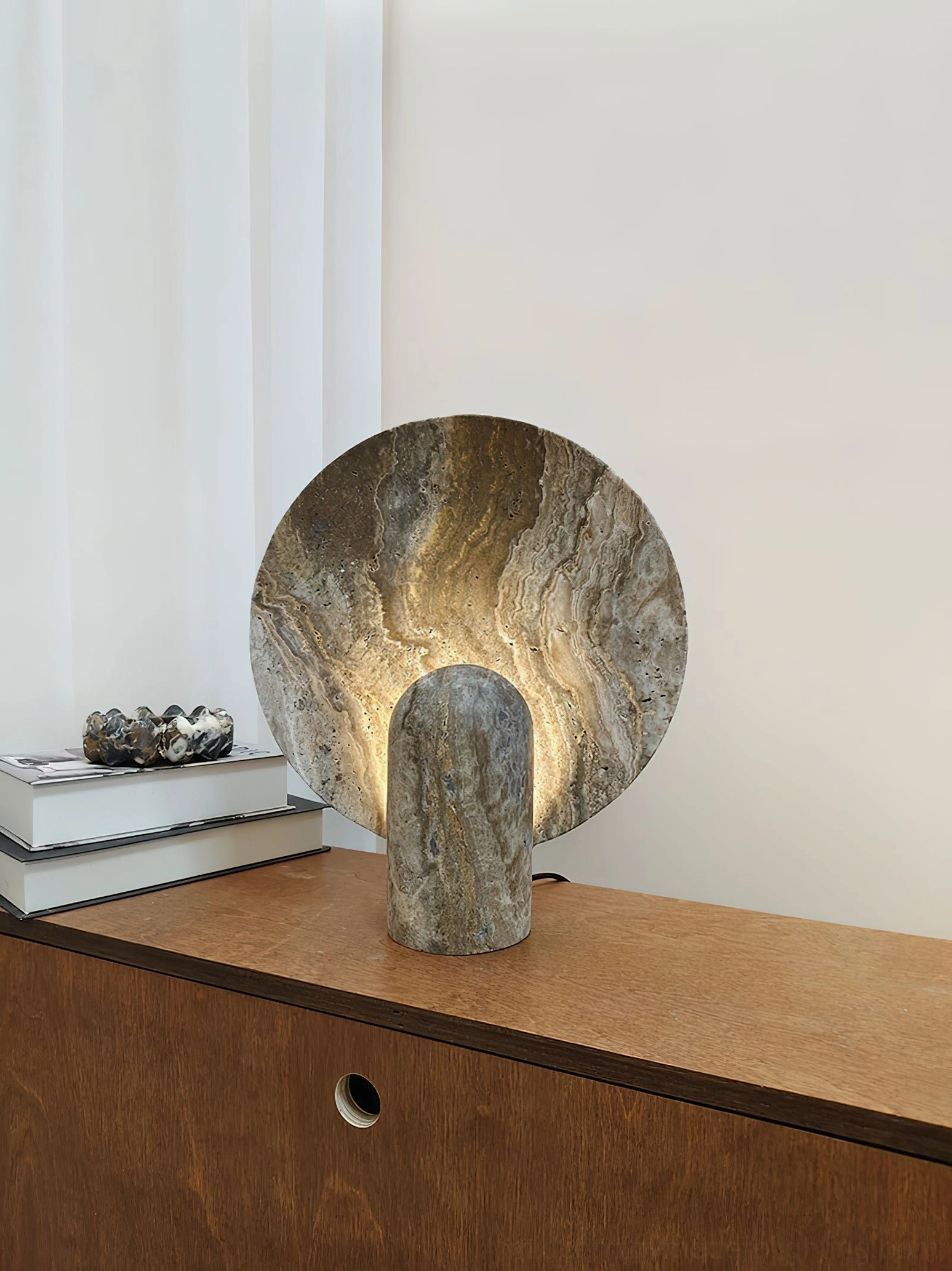 Contemporary marble table lamp showing warm ambient light quality and 10W power efficiency for responsible modern design