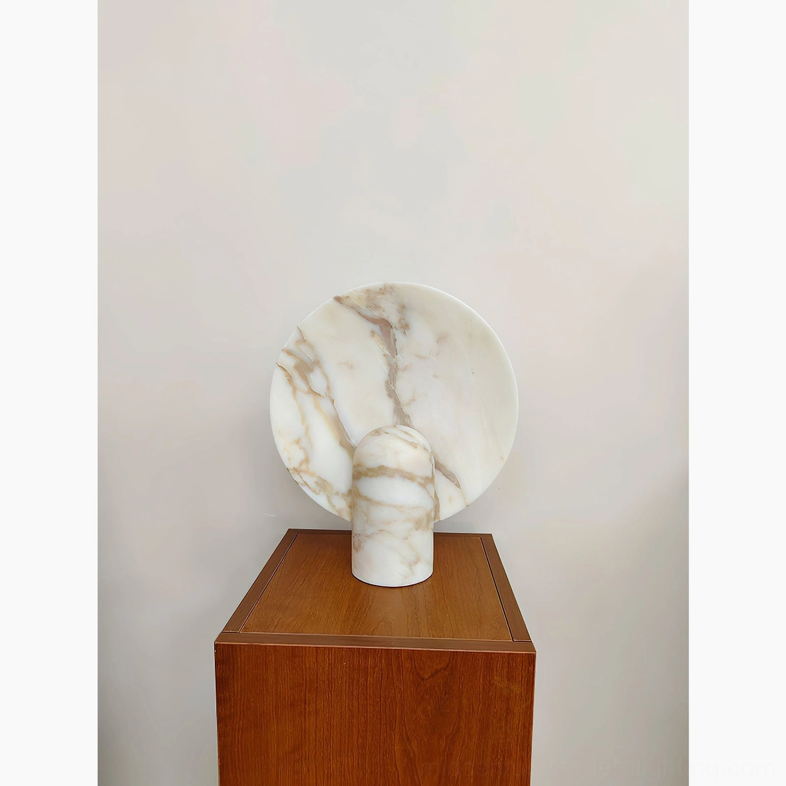 Marble table lamp architectural perspective emphasizing geometric form and sculptural minimalist silhouette on neutral background