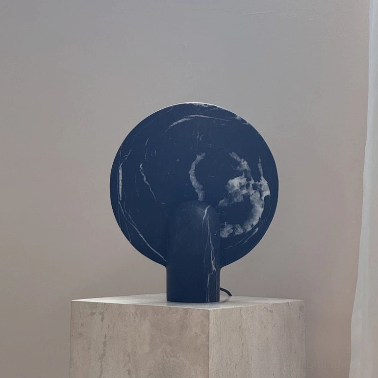 Marble table lamp hero shot showcasing integrated LED technology and minimalist modern design for mid-century contemporary homes