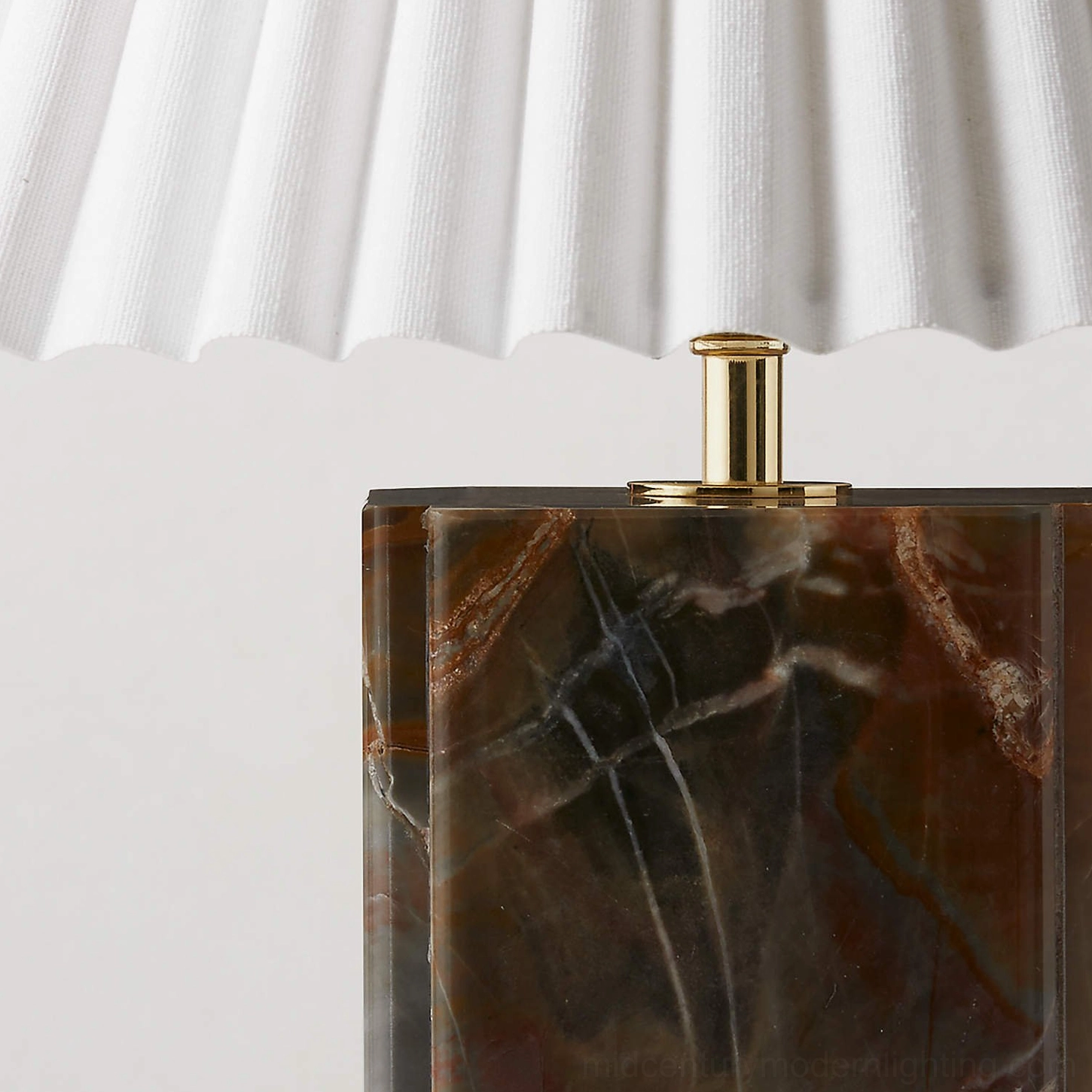 Bianca marble table lamp macro photography of pleated shade construction and brass hardware