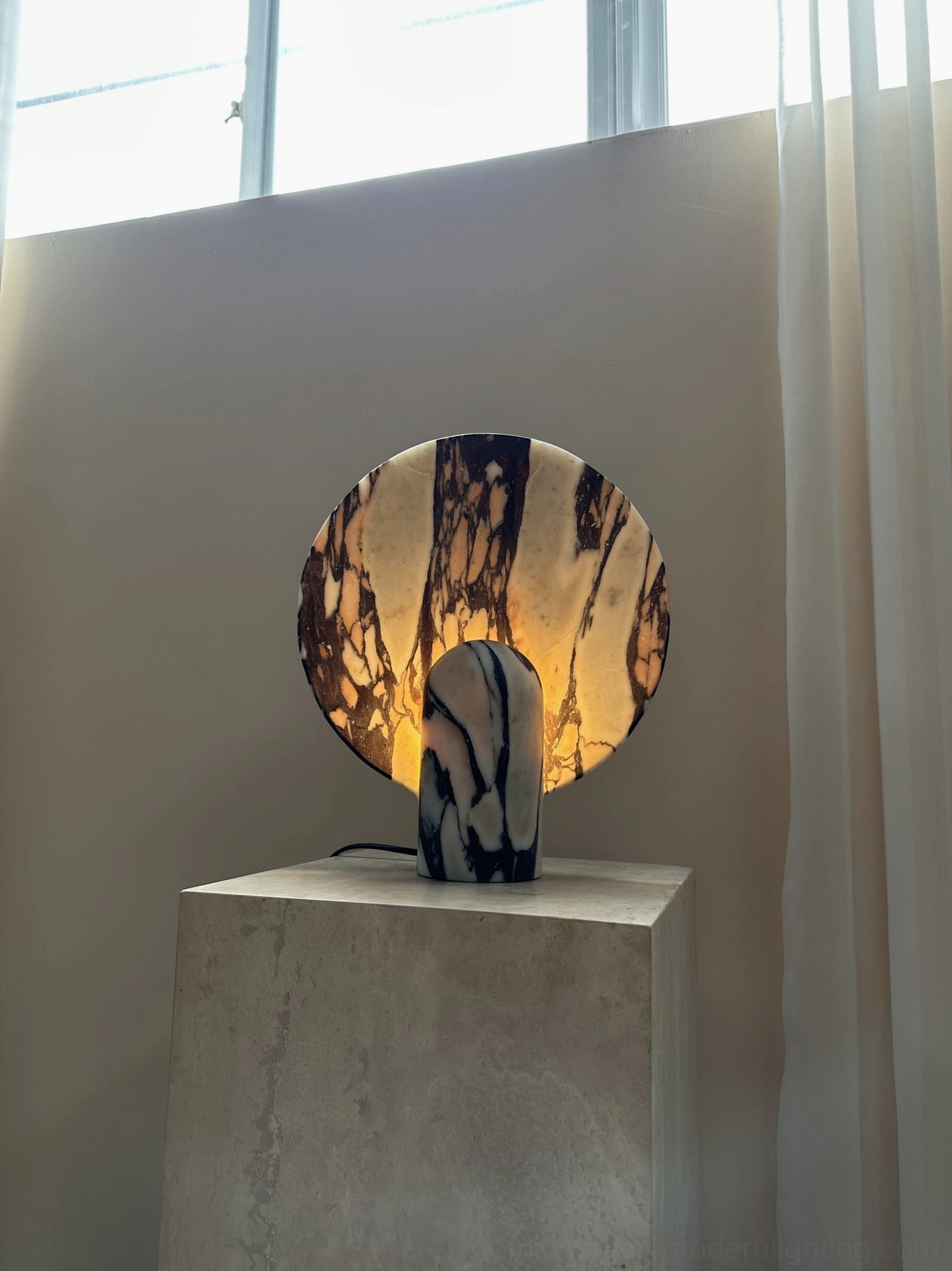 Detail of marble table lamp showing natural stone characteristics and premium craftsmanship in contemporary lighting design