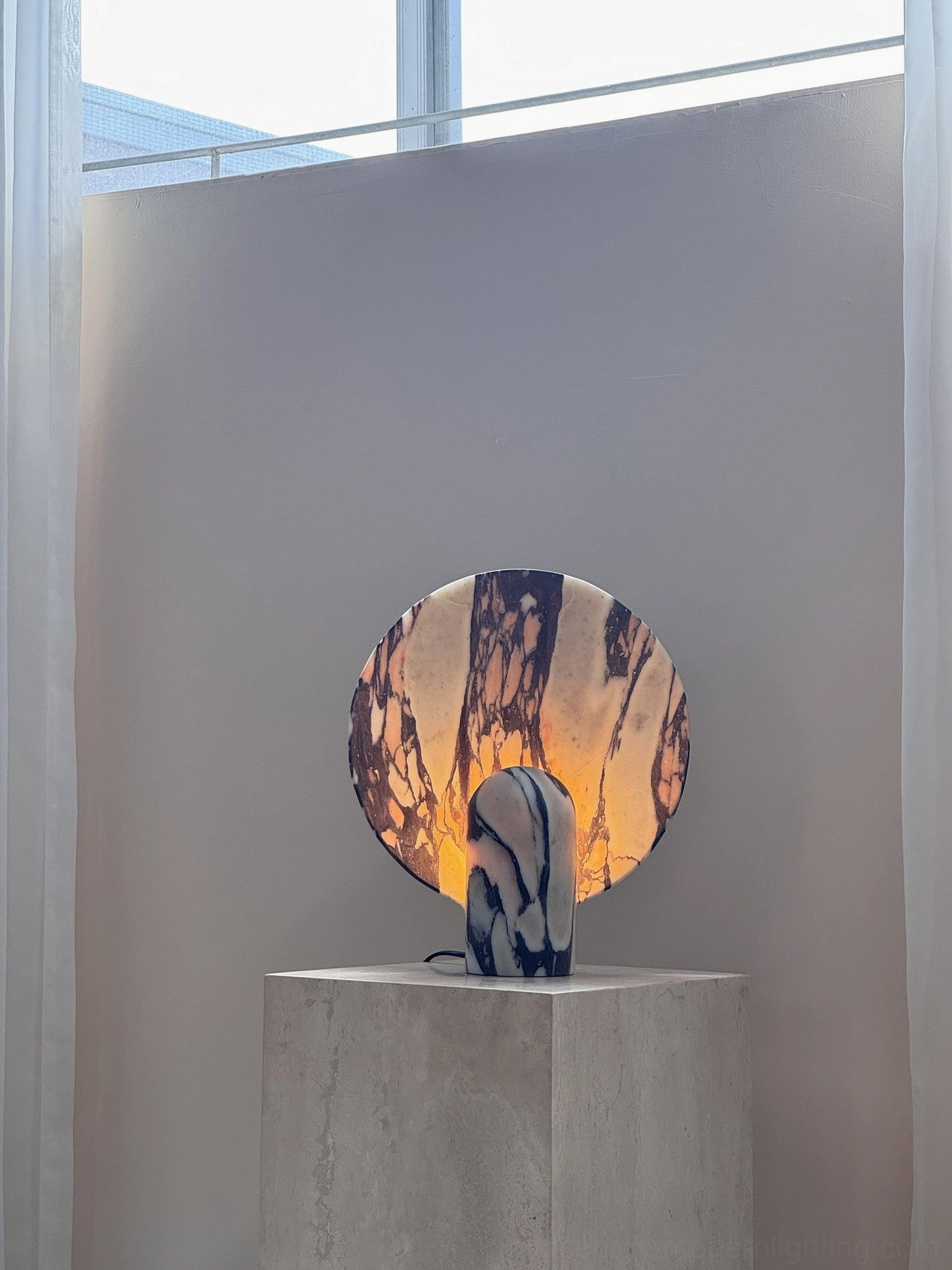 Marble table lamp full product shot in studio lighting highlighting premium material quality and integrated LED technology