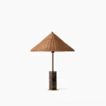 Marble and rattan table lamp front view - mid-century modern sculptural design with natural materials