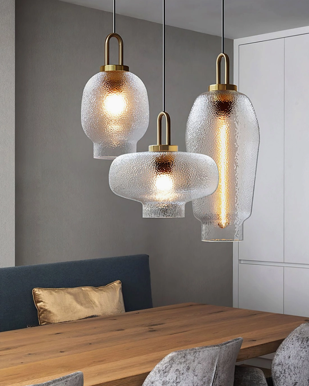 Marco textured glass pendant lamp with brass accents showcasing light diffusion and glass texture detail