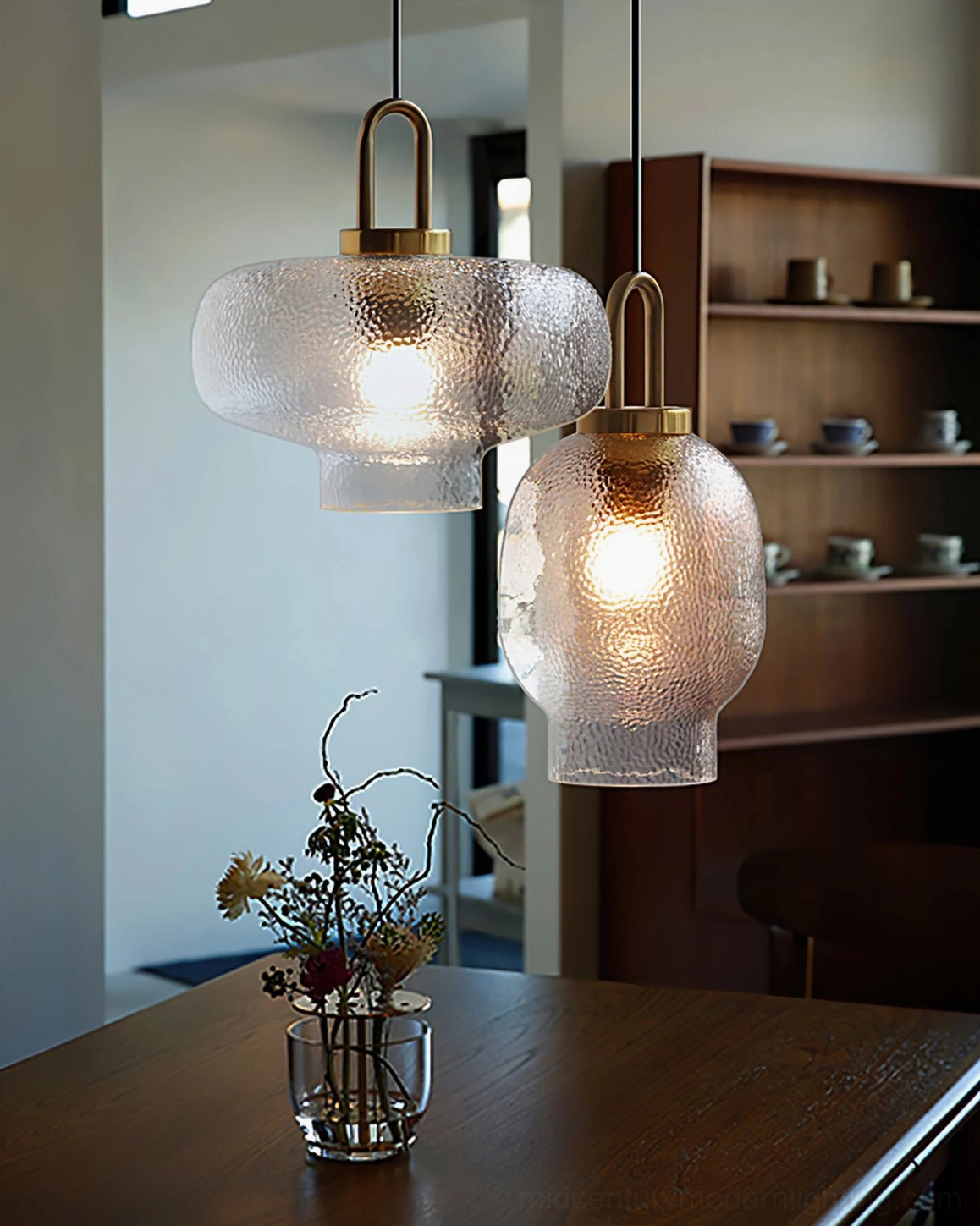 Marco pendant lamp installation showing brass suspension hardware and rope connector with textured glass shade