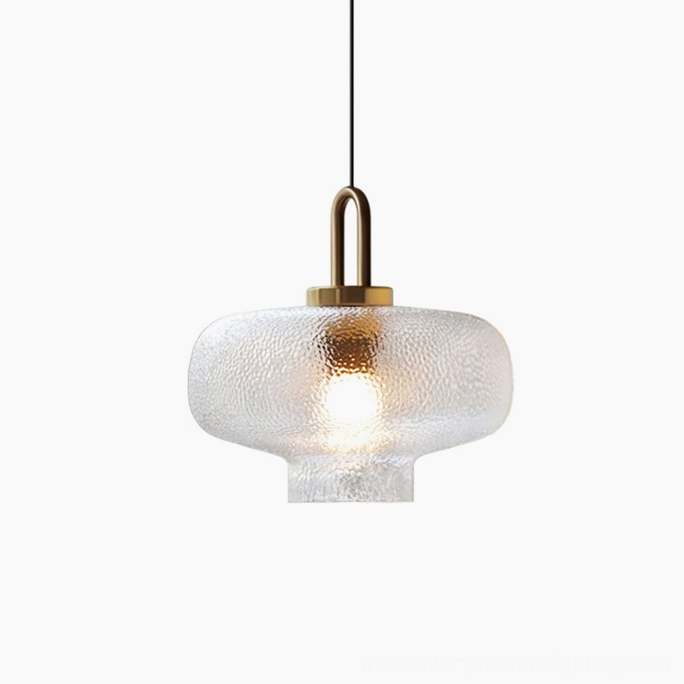 Model A Marco wide pendant lamp with large textured glass shade and brass hardware, studio photography