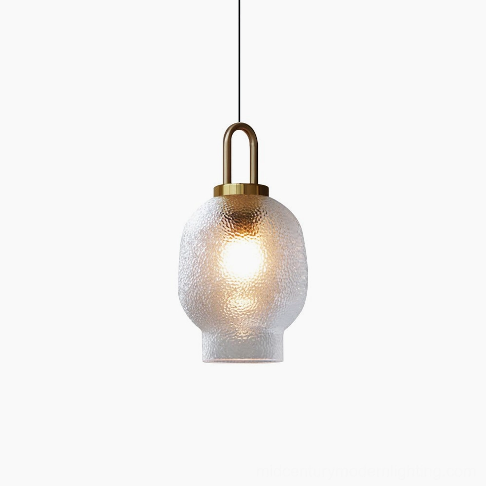 Model B Marco compact pendant lamp with textured glass shade and brass accents in interior space