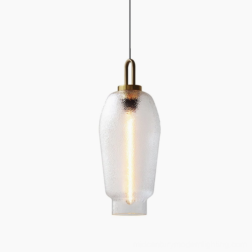 Model C Marco tall barrel pendant lamp with rippled glass shade and brass top fixture in contemporary room
