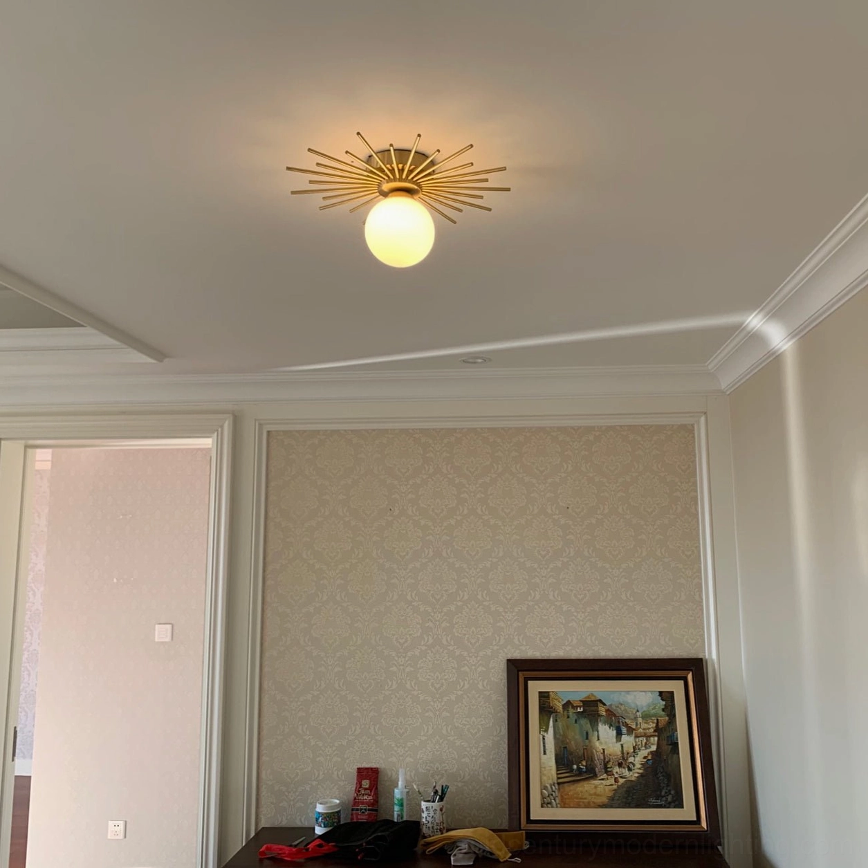 Margaret mid-century sputnik ceiling lamp finish detail, brushed brass radial arms with frosted shade