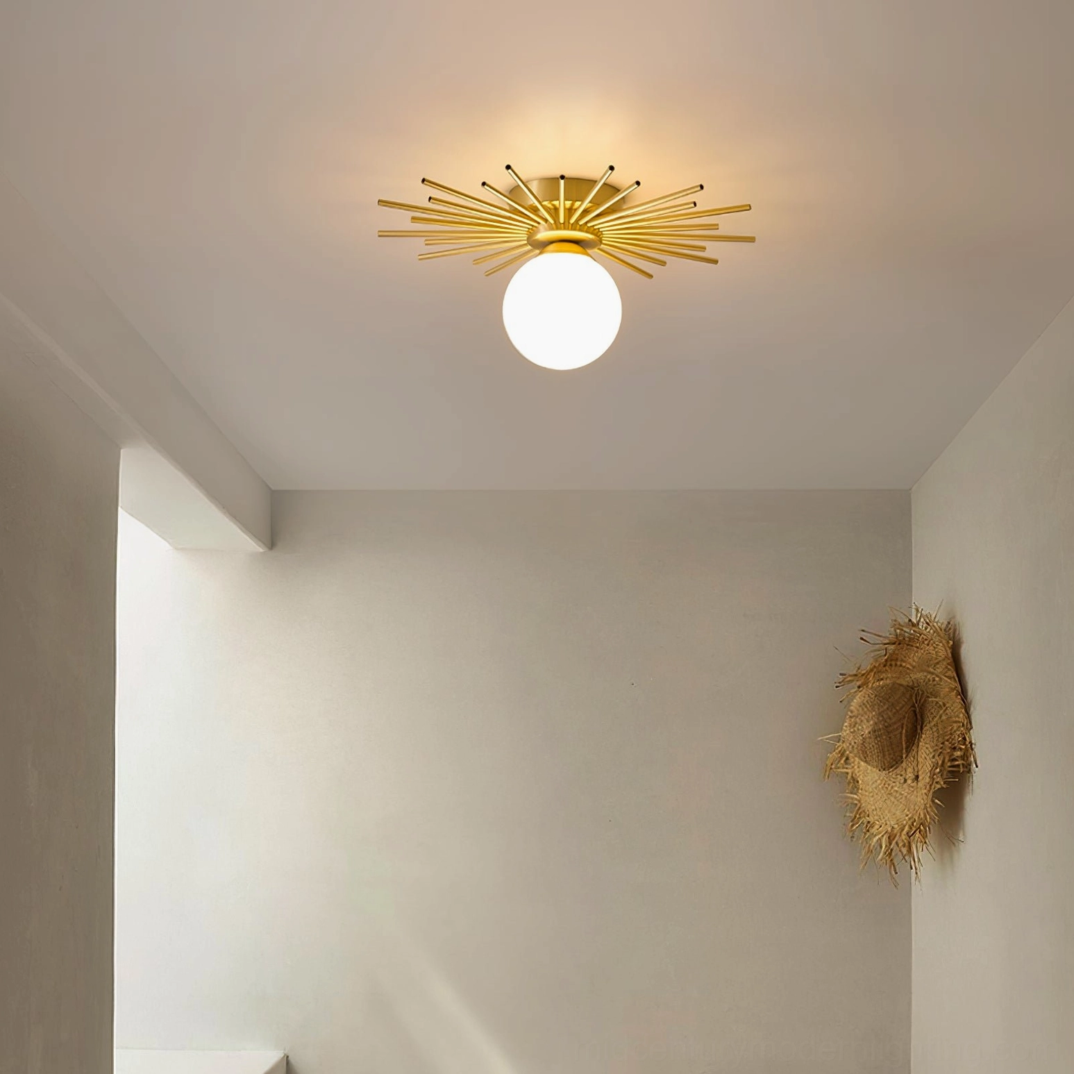 Margaret starburst flush mount in narrow hallway with wall decor, minimalist warm home lighting solution