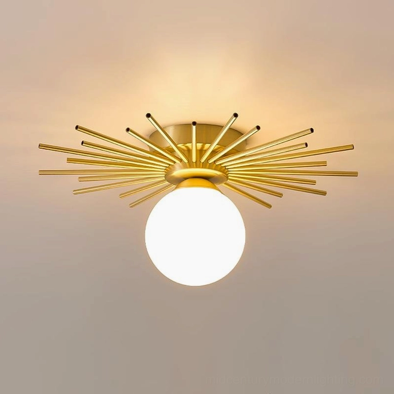 Sputnik style Margaret ceiling lamp mounted on warm grey ceiling, overhead view showing frosted glass shade and brass finish