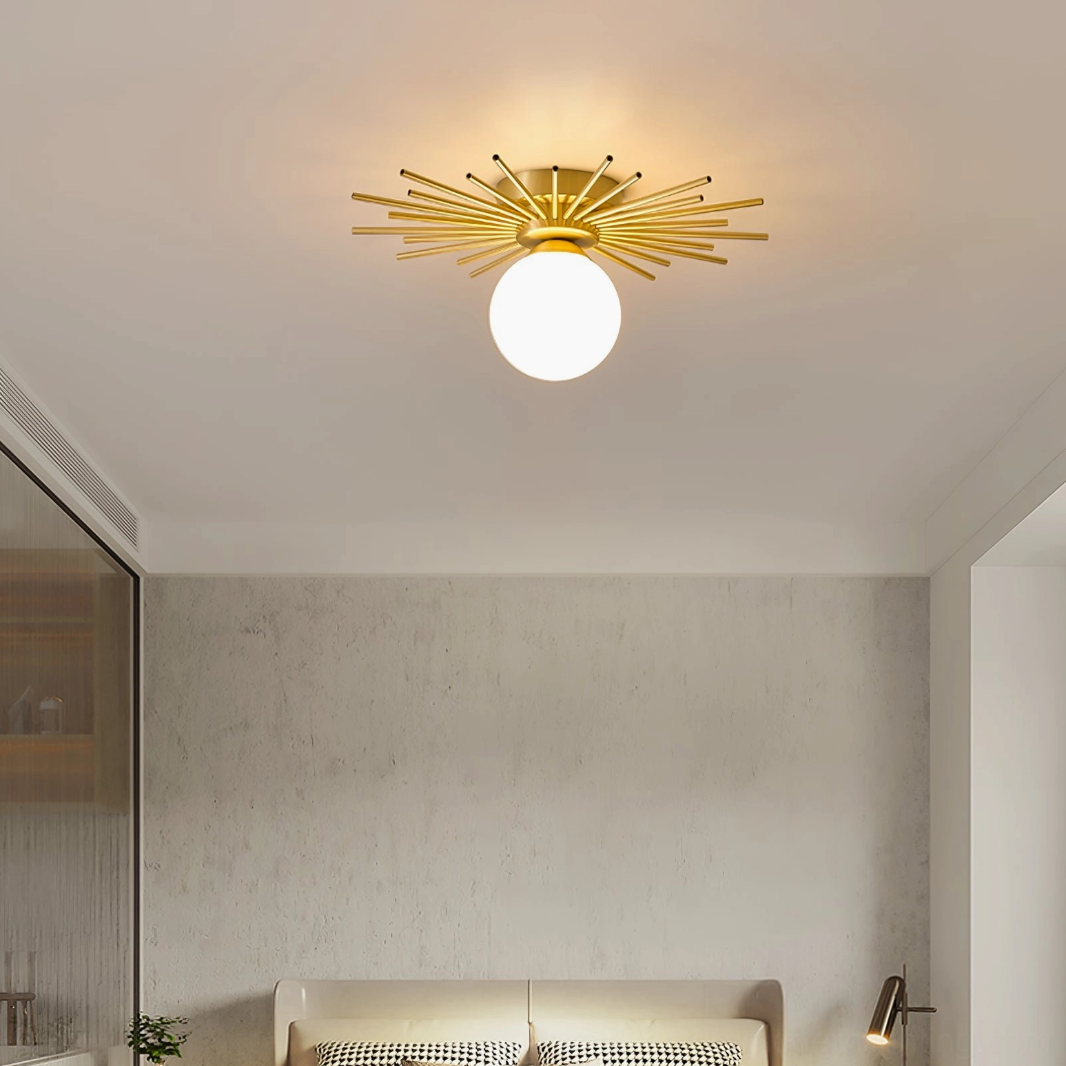 Margaret starburst lamp in minimalist bedroom with concrete wall accent, warm tonal modern bedroom lighting