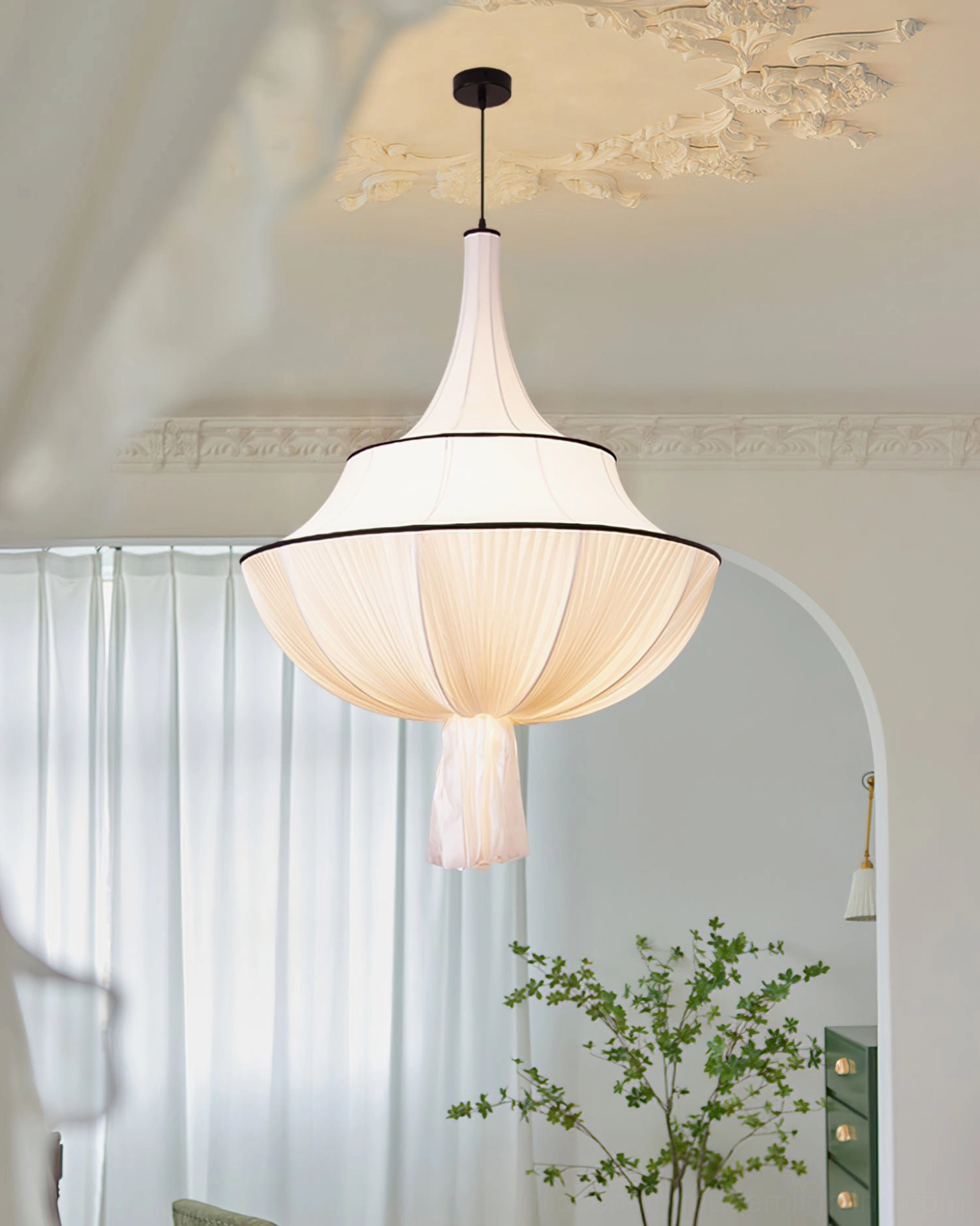 Marianna pleated fabric pendant lamp with ornate ceiling medallion in bright living room with sheer curtains