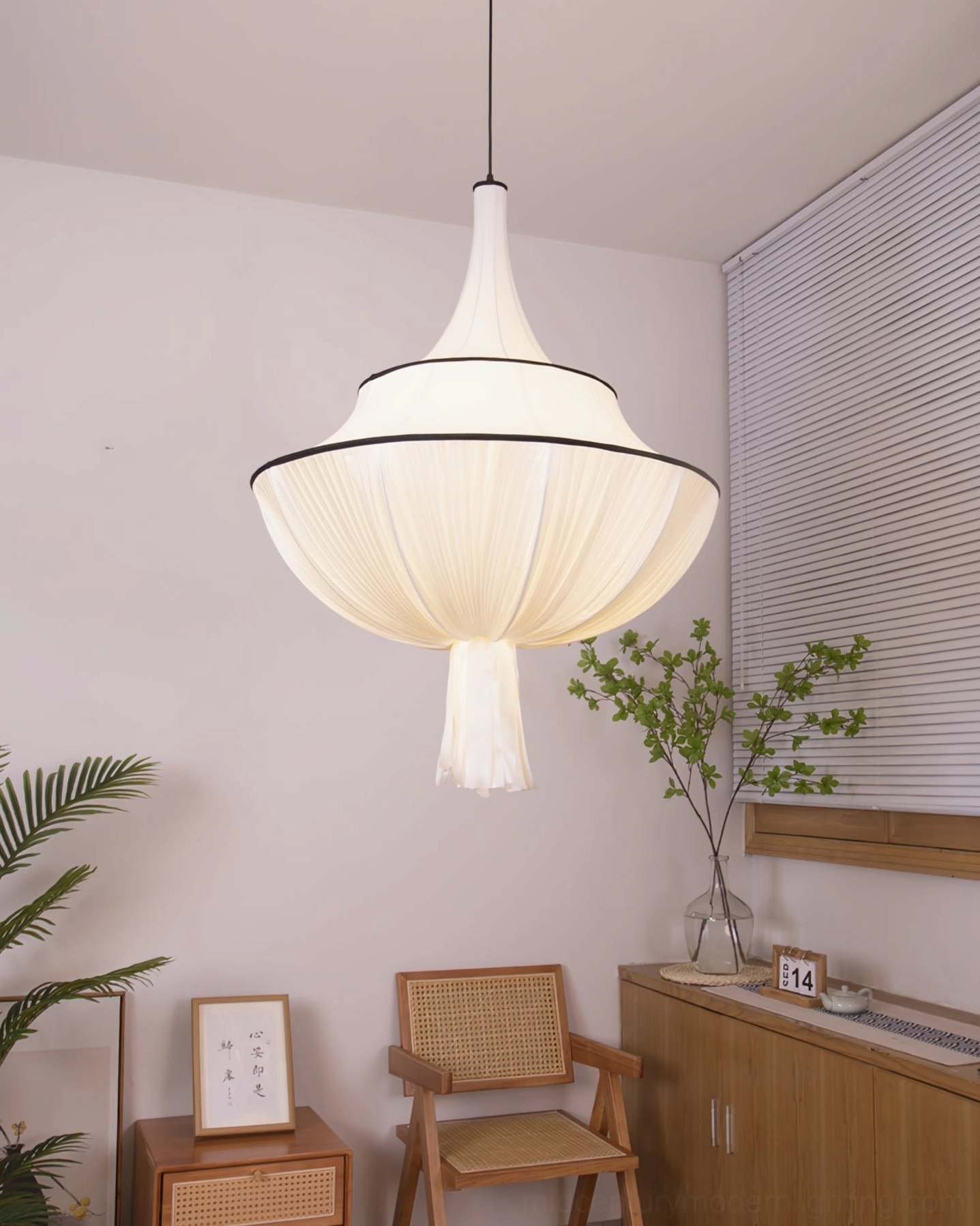 Marianna pleated fabric pendant light in warm dining nook with wooden furniture and minimalist home styling