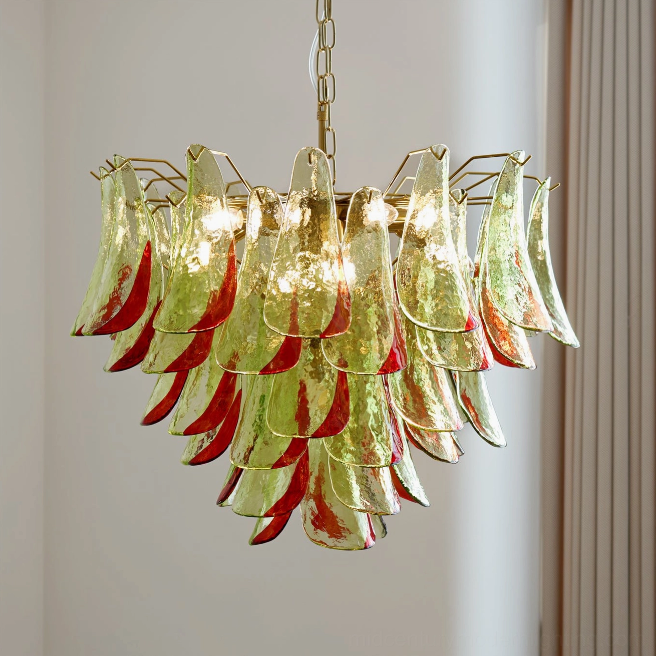 Illuminated Marielle chandelier showcasing warm light diffusion through hand-blown glass petals in interior setting