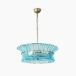 Marin Aquamarine Glass Chandelier - Mid-Century Modern pendant light with blue fluted glass and gold metal hardware, studio front view