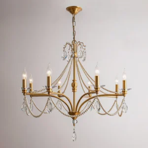 Close-up overhead view of Mariposa crystal chandelier showing candle-style light holders and crystal arrangement