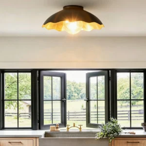 Scalloped flush mount light installed in farmhouse kitchen - upward ceiling angle showing matte black finish matching hardware