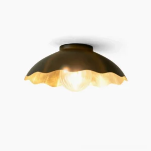 Marlowe scalloped flush mount ceiling light - front studio view showing matte black dome with gold interior trim and frosted glass