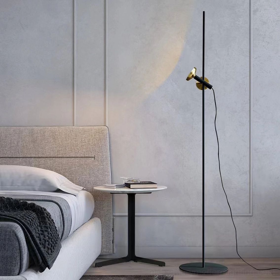 Marquina black marble floor lamp beside bedroom nightstand, minimalist luxury bedroom setting with side view