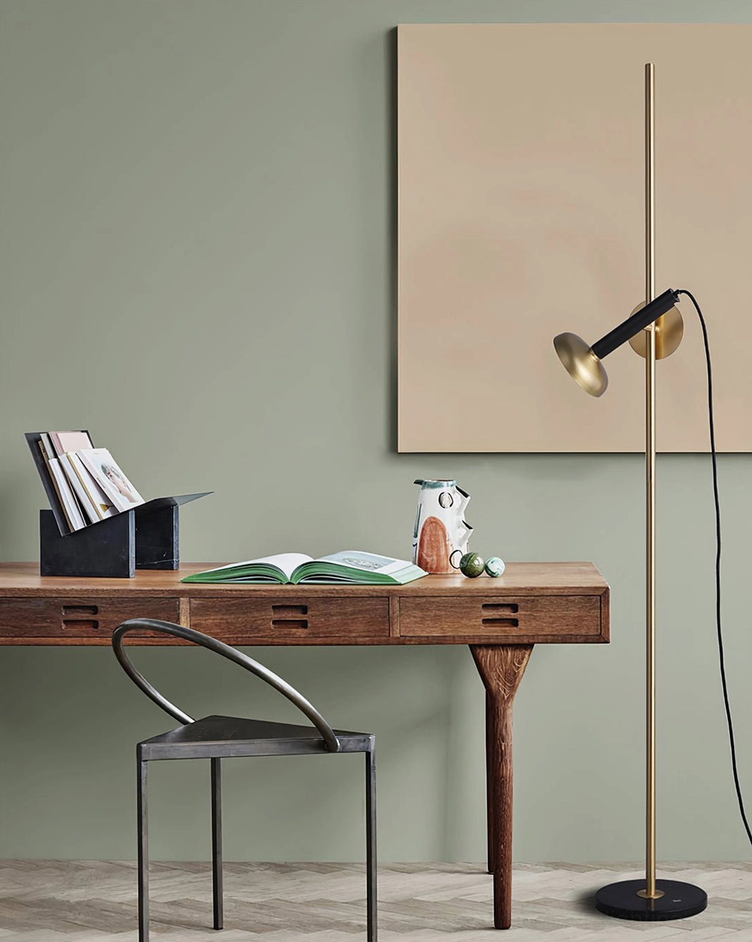 Marquina marble base floor lamp detail, black stone sculptural foundation with brass accent