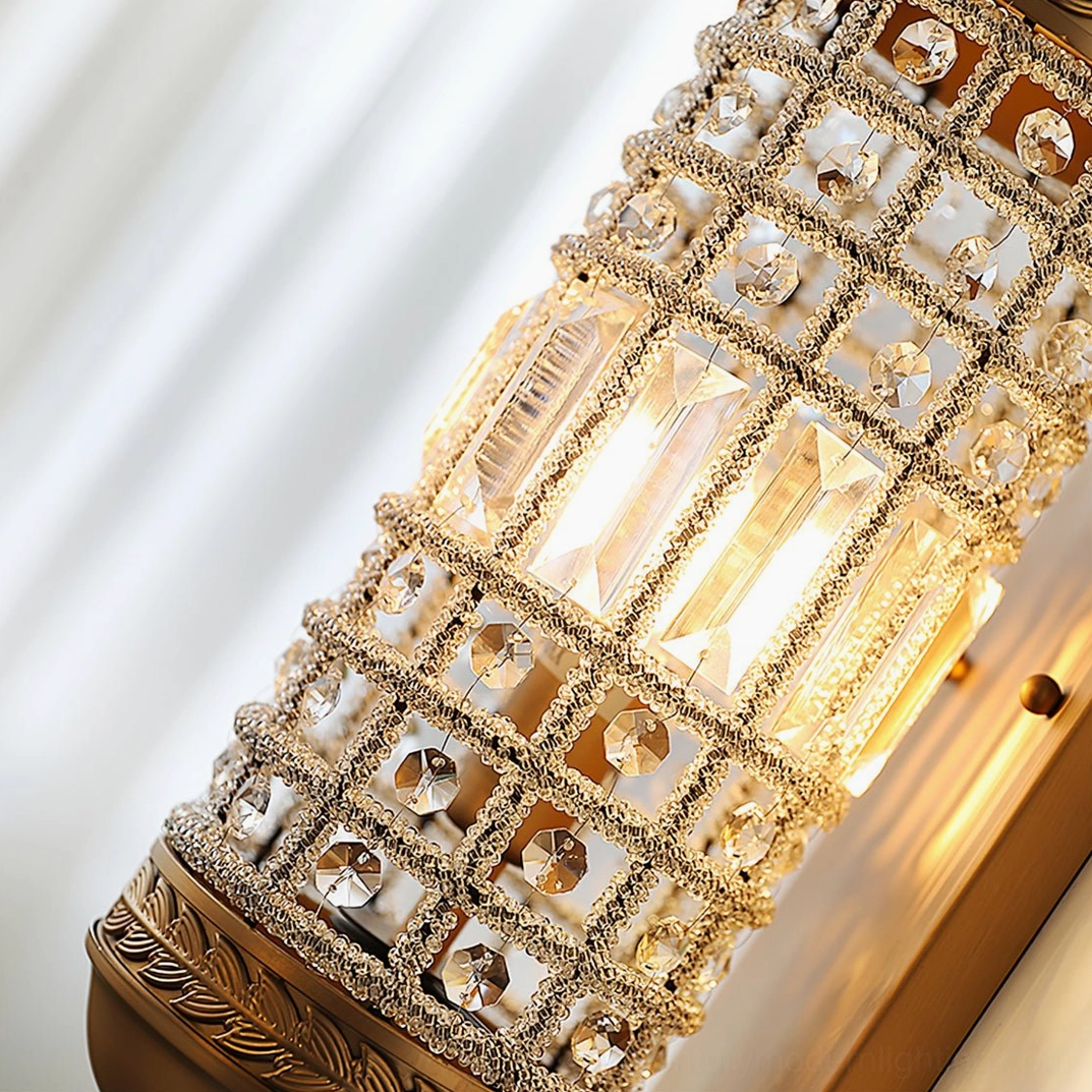 Marrakech gold crystal wall sconce front view showing geometric brass frame and crystalline elements