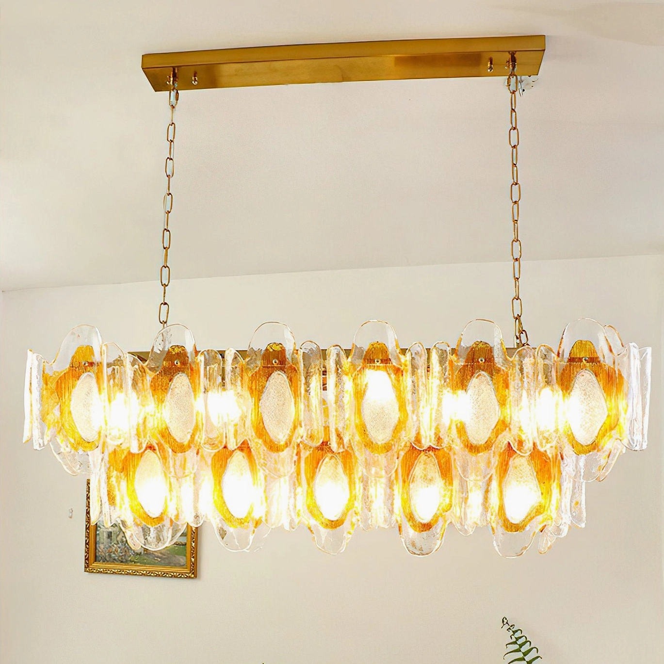 Marrina sculptural pendant chandelier in contemporary interior space demonstrating sophisticated ambient lighting and design presence