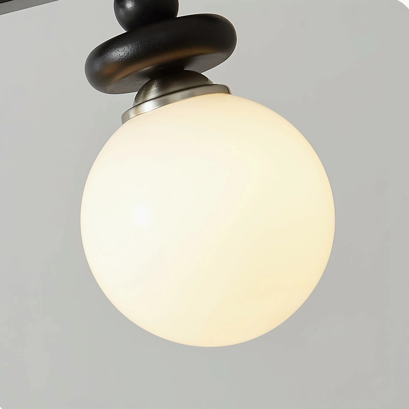 Maru ribbed glass pendant light - product photography highlighting frosted textured globe and sleek black metal frame construction