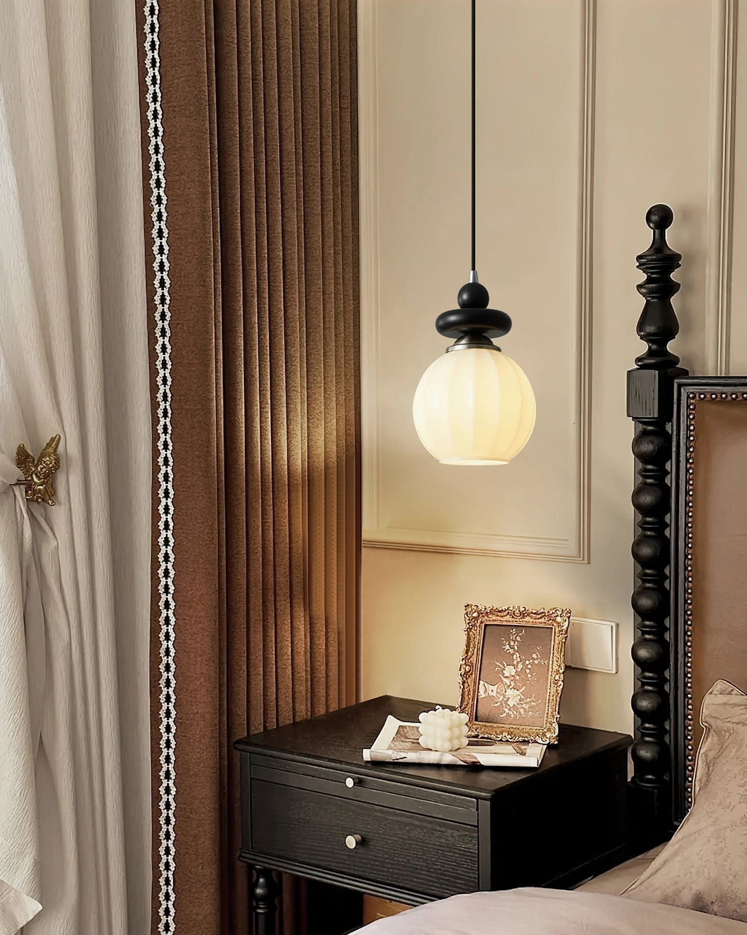 Close-up side view of Maru ribbed glass globe pendant showing textured frosted glass detail and warm light diffusion in bedroom
