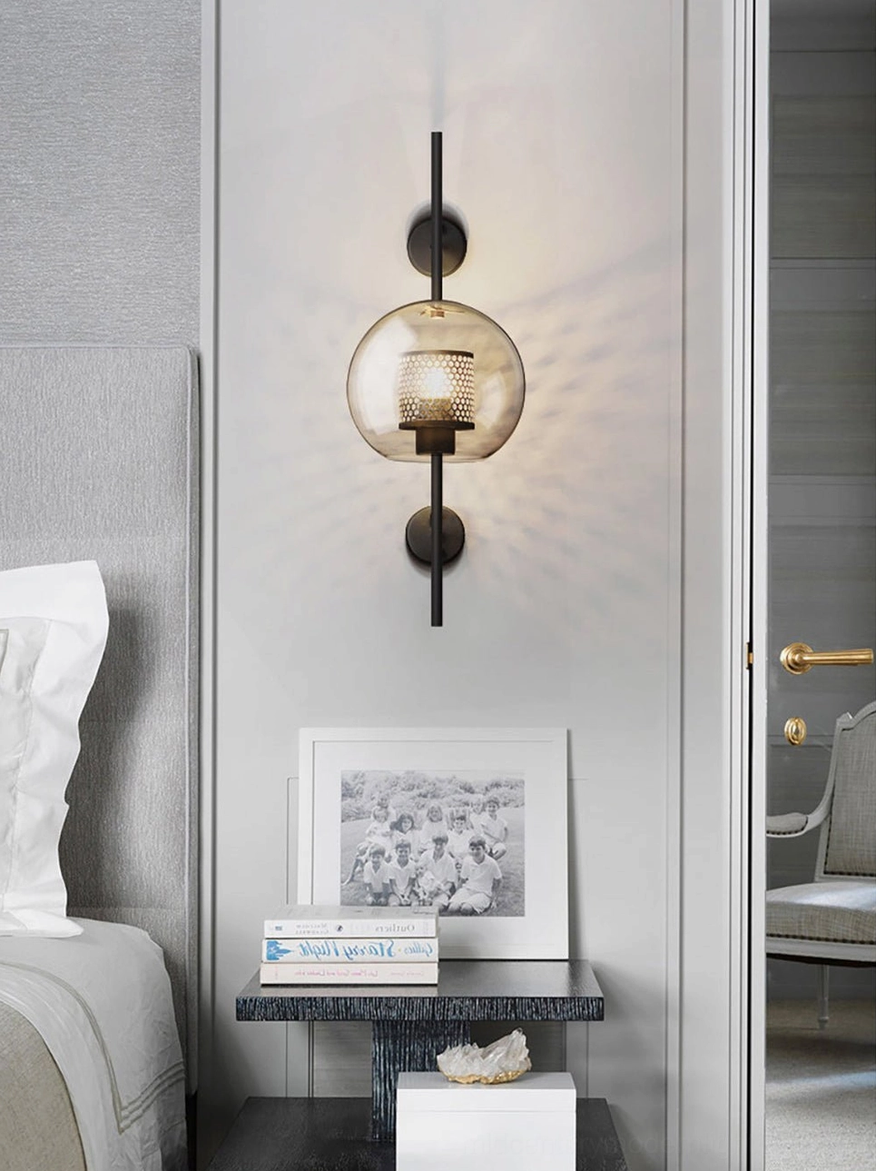 Matching glass wall sconces creating symmetrical modern lighting composition