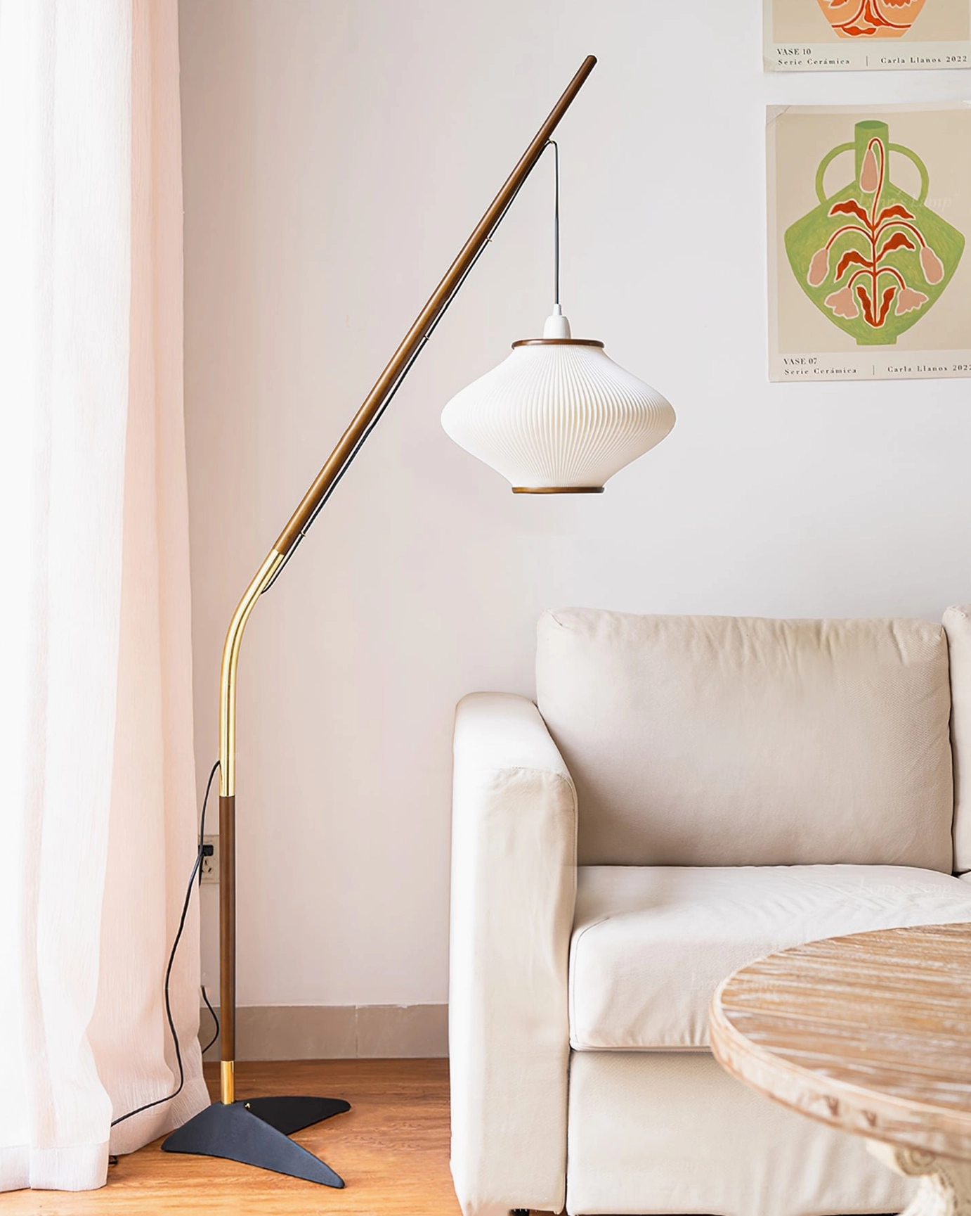 Matsusu mid-century modern lamp in minimalist living room with round table and white pleated shade
