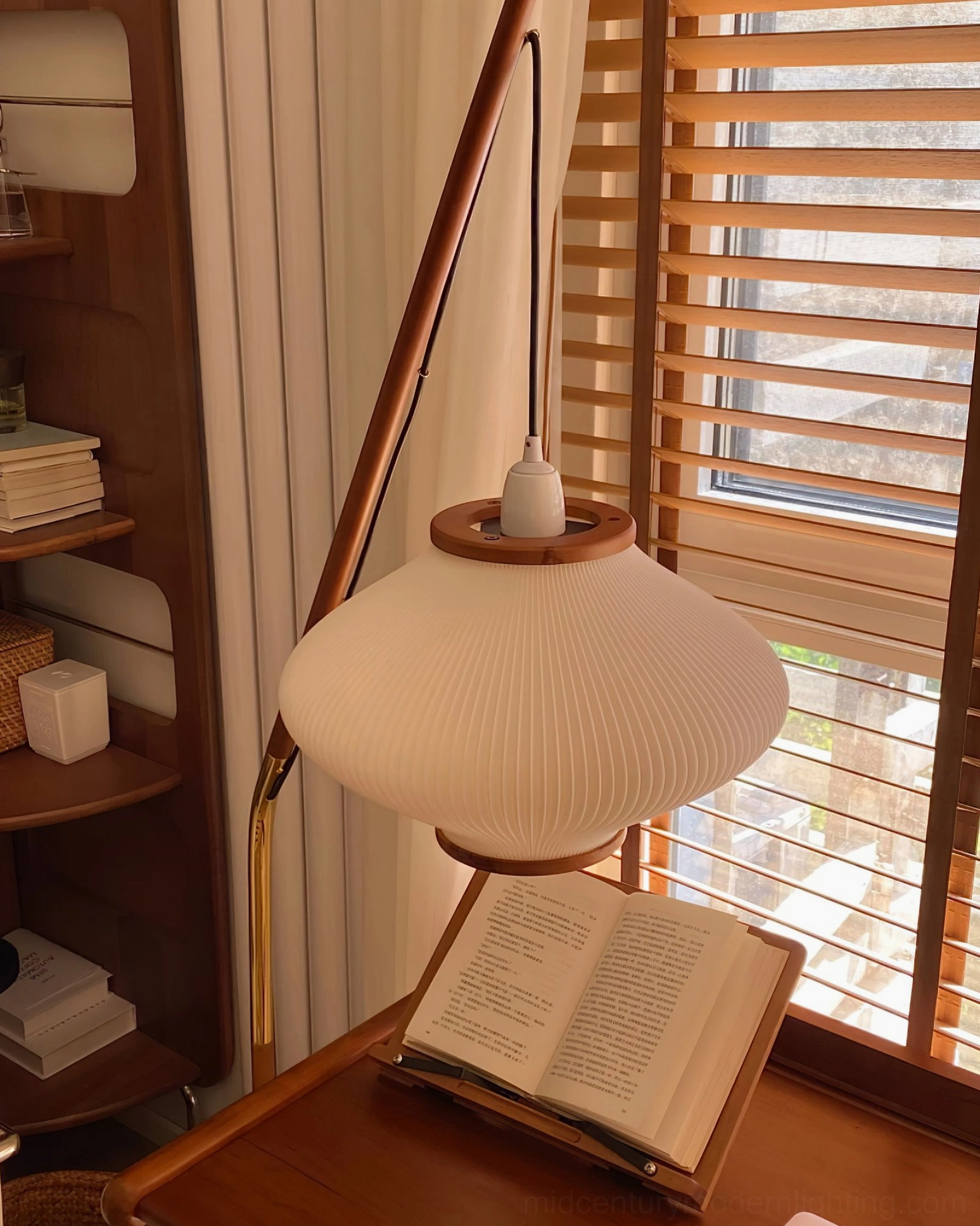 Matsusu arc floor lamp detail view of power cord switch and base stability features
