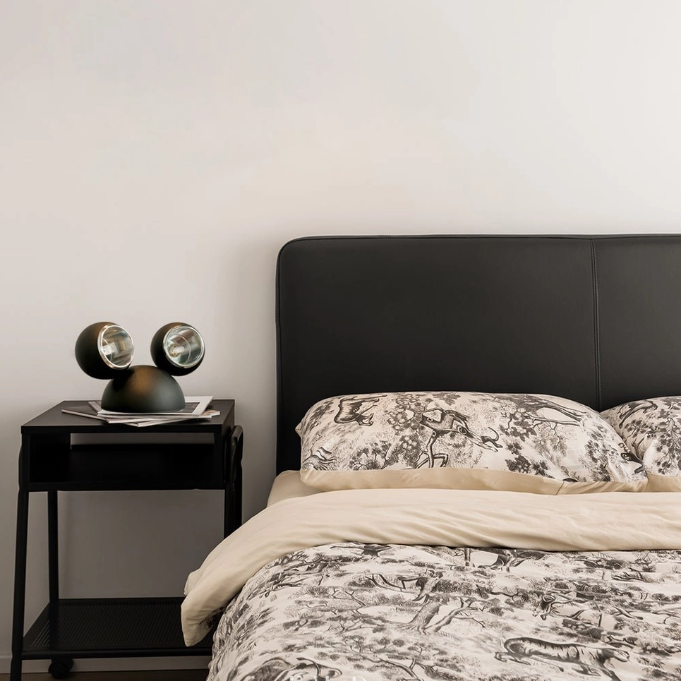 Matte black Mickey modern table lamp on bedroom bedside table in master bedroom neutral decor