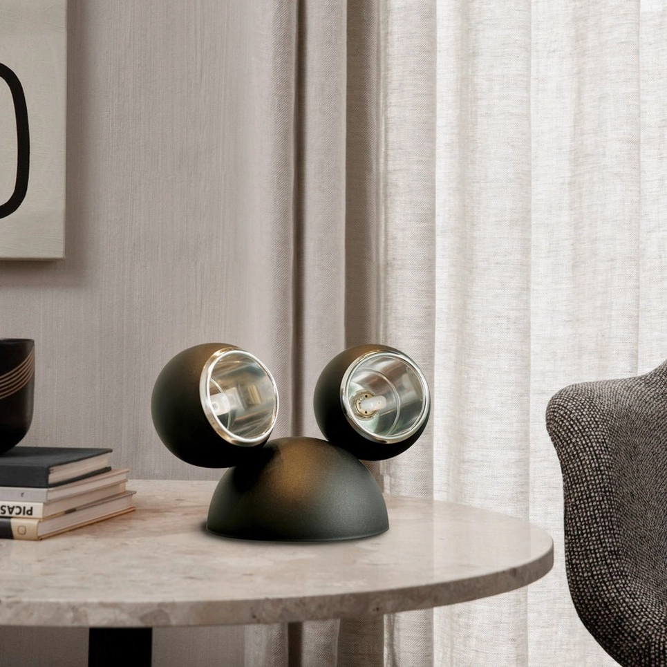 Matte black Mickey table lamp on round side table living room with sheer curtains minimalist aesthetic