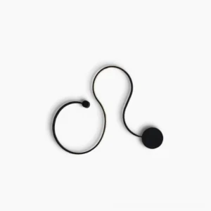 Matte black sculptural snake wall sconce with organic curved form on white background