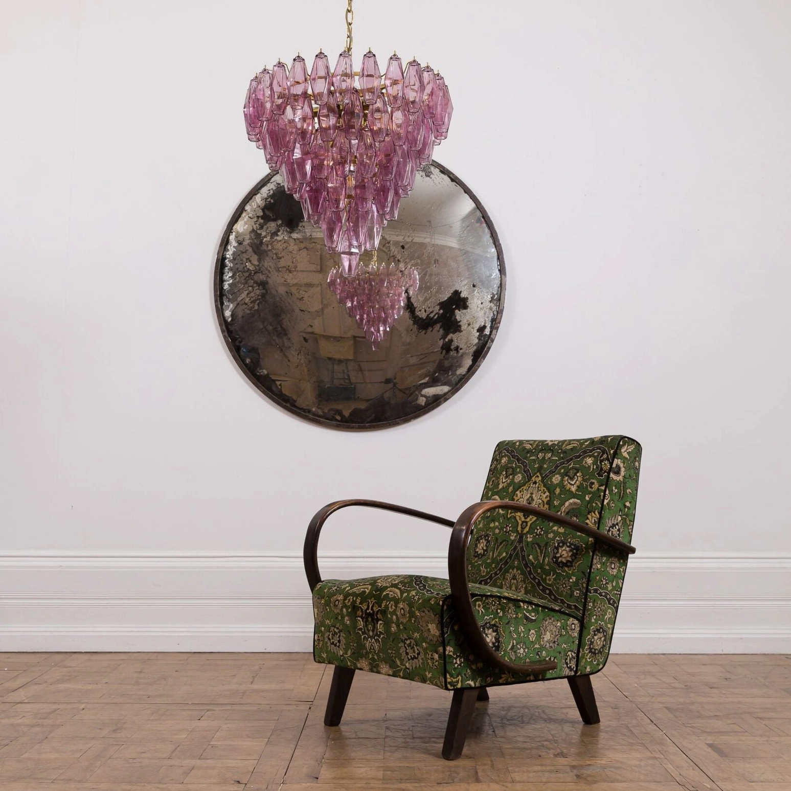 Lavender mauve tiered crystal chandelier in modern minimalist interior with contemporary furnishings