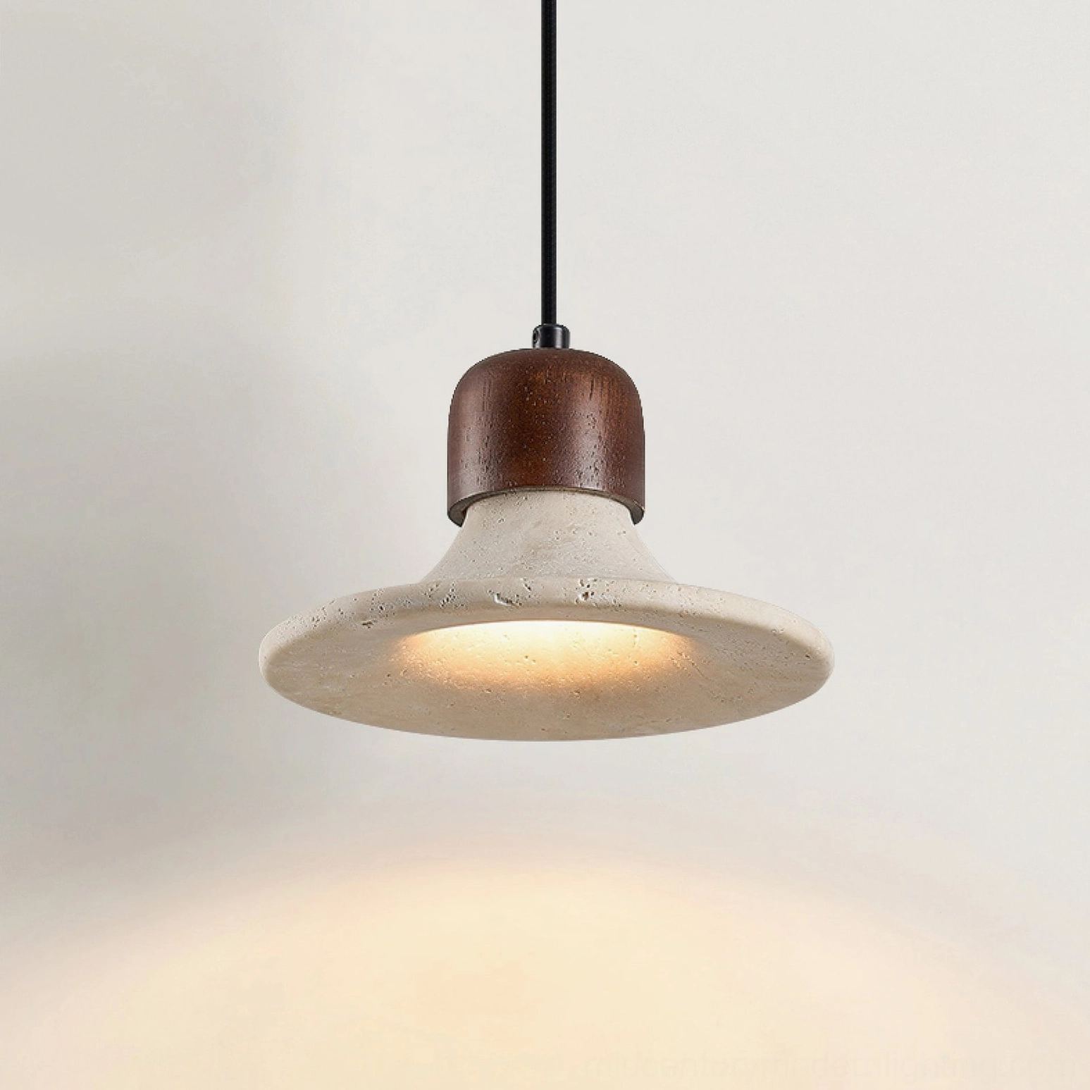 Mayu travertine pendant lamp bottom-up interior view glowing bulb illumination