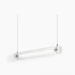 Mazha linear LED pendant lamp with clear glass housing and chrome fixtures, studio front view